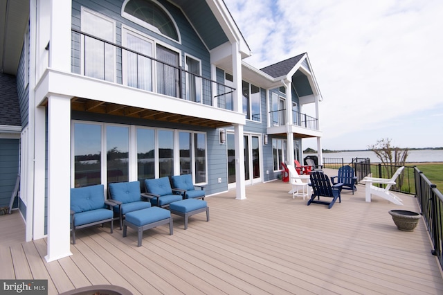 wooden terrace featuring an outdoor hangout area