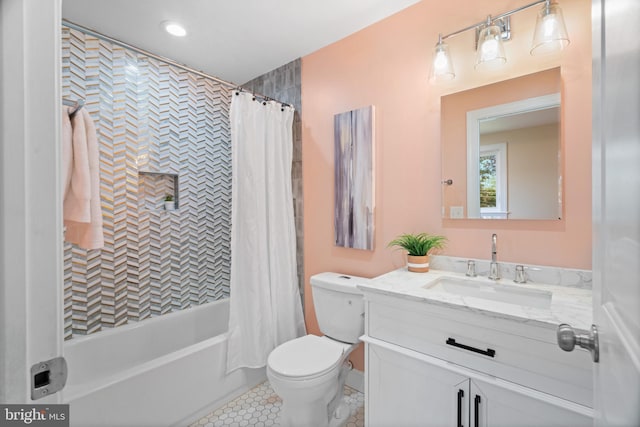 full bathroom featuring vanity, shower / bath combo, toilet, and tile patterned floors