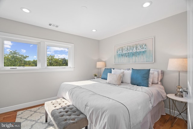 bedroom featuring hardwood / wood-style flooring