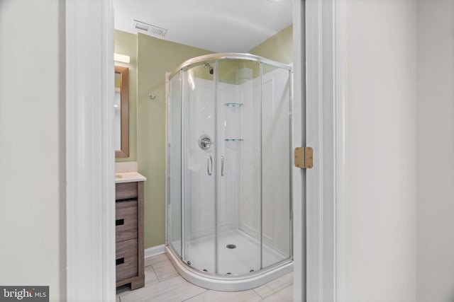 bathroom featuring vanity and walk in shower