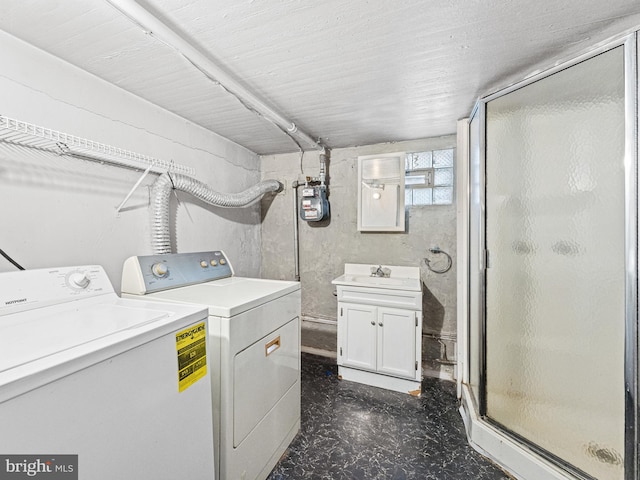 laundry area featuring washer and dryer and sink