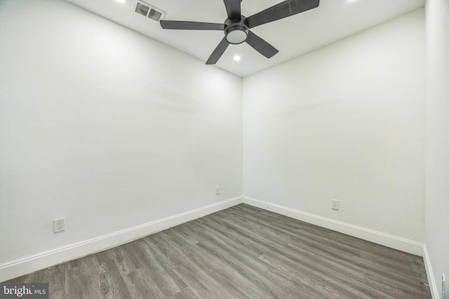empty room featuring recessed lighting, wood finished floors, visible vents, baseboards, and ceiling fan