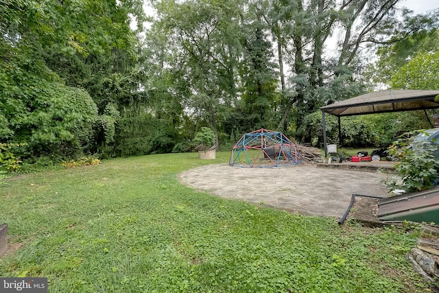 view of yard with a gazebo and a patio