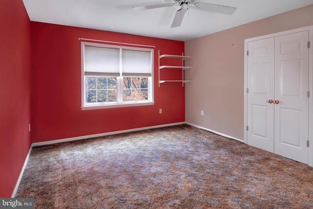 unfurnished bedroom featuring carpet and ceiling fan