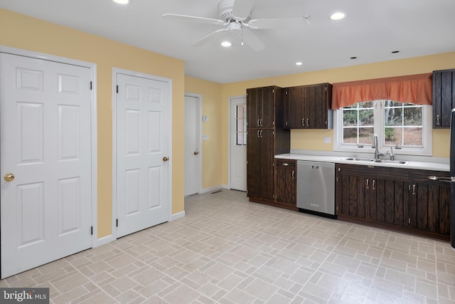 kitchen with ceiling fan, dark brown cabinetry, sink, and stainless steel dishwasher