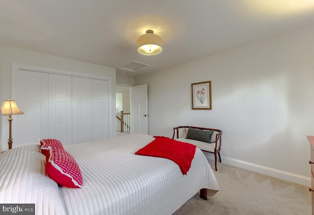 carpeted bedroom featuring a closet