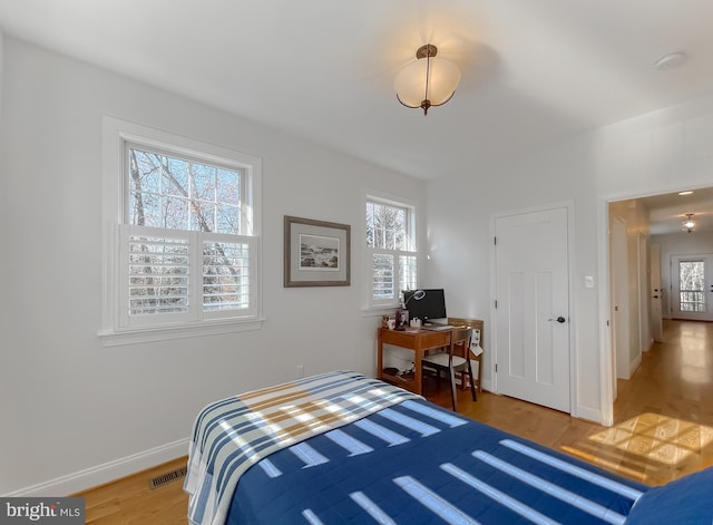 bedroom featuring hardwood / wood-style floors