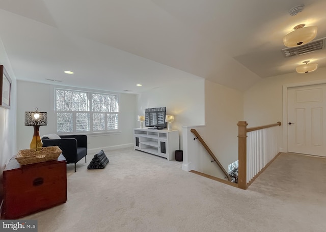 sitting room featuring carpet floors