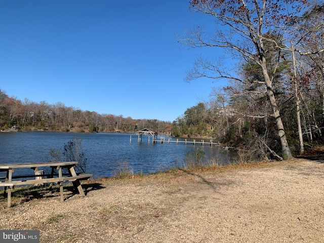 view of dock with a water view