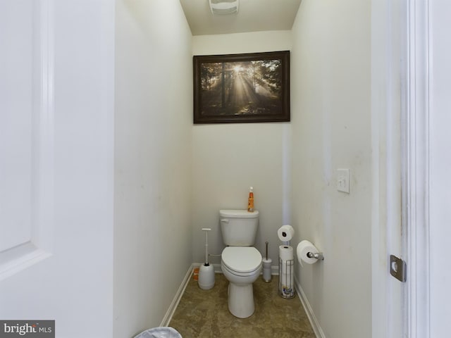 bathroom featuring toilet