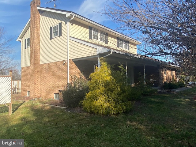 view of property exterior featuring a yard