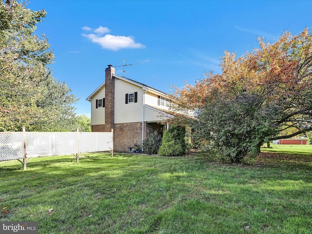 exterior space featuring a yard