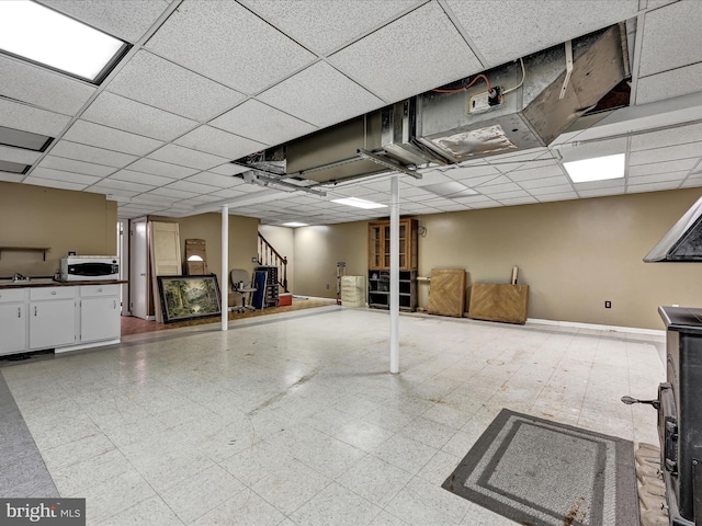 basement with a drop ceiling