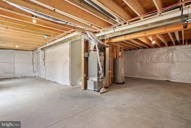 basement featuring water heater and heating unit