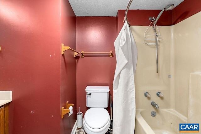 full bathroom with shower / bath combination with curtain, vanity, a textured ceiling, and toilet