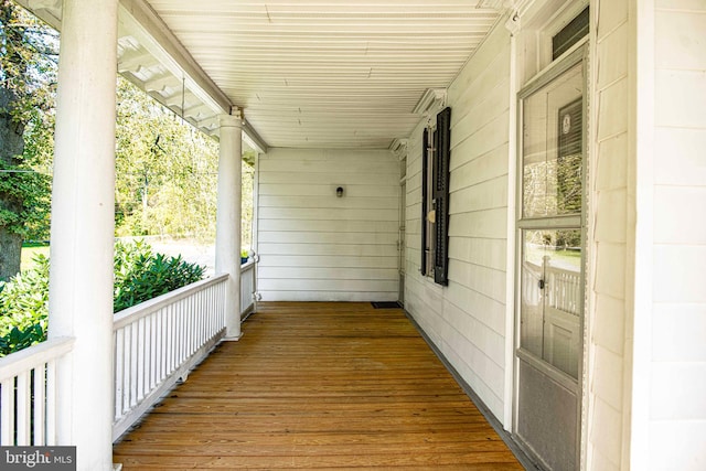 wooden deck featuring covered porch