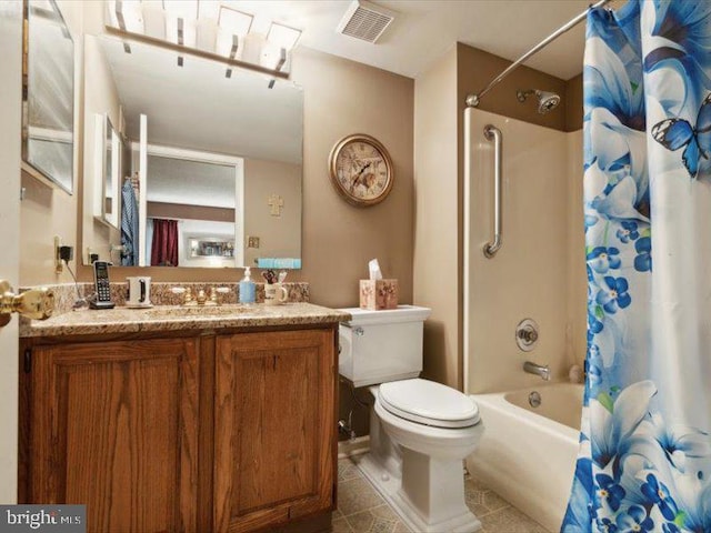 full bathroom featuring tile patterned floors, vanity, toilet, and shower / bath combo with shower curtain