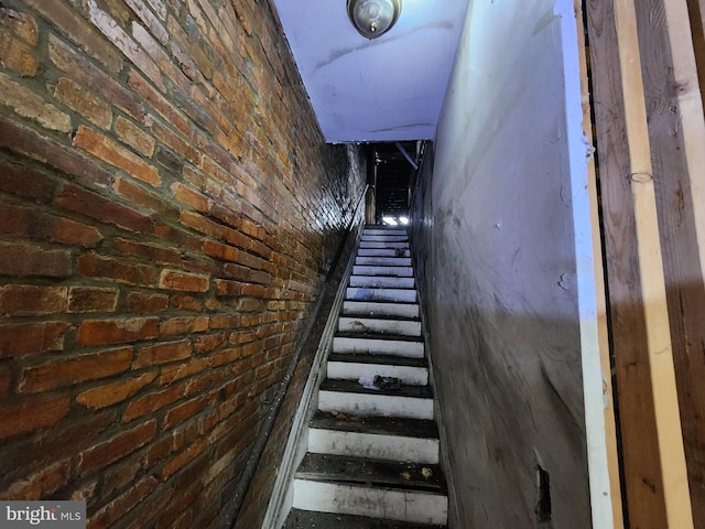 stairs with brick wall