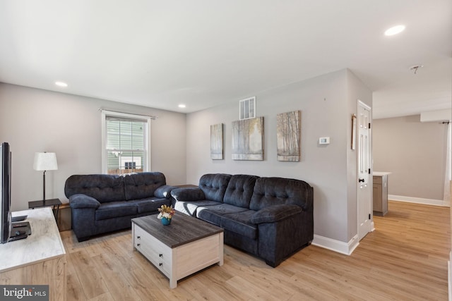 living room featuring light hardwood / wood-style floors