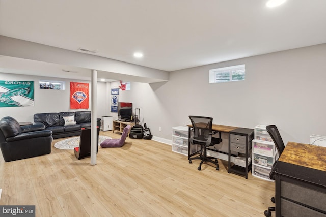 home office featuring hardwood / wood-style floors