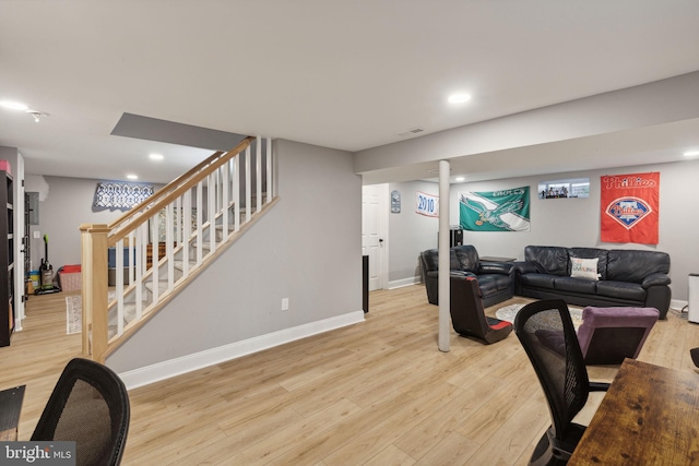 office with light hardwood / wood-style flooring