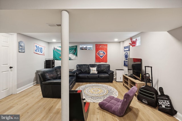 living room with wood-type flooring