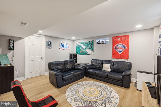 living room with hardwood / wood-style floors