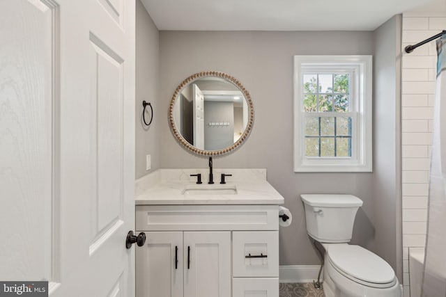 full bathroom featuring vanity, toilet, and shower / bathtub combination with curtain