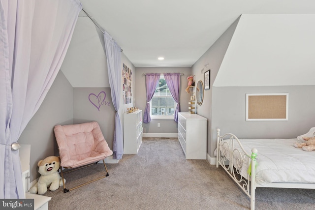 bedroom with light colored carpet