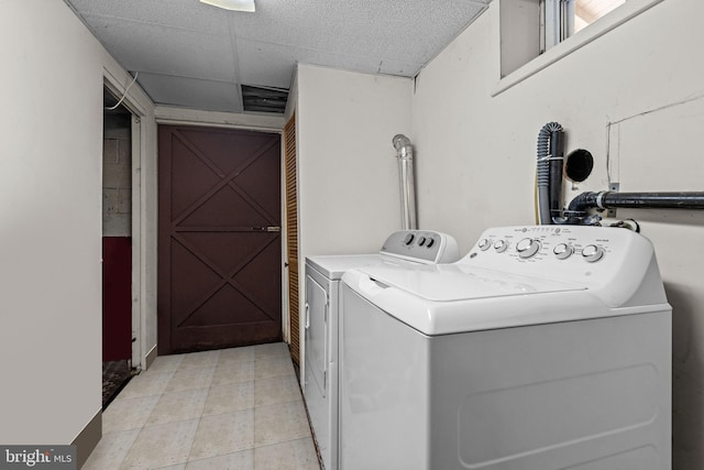 clothes washing area with washer and dryer