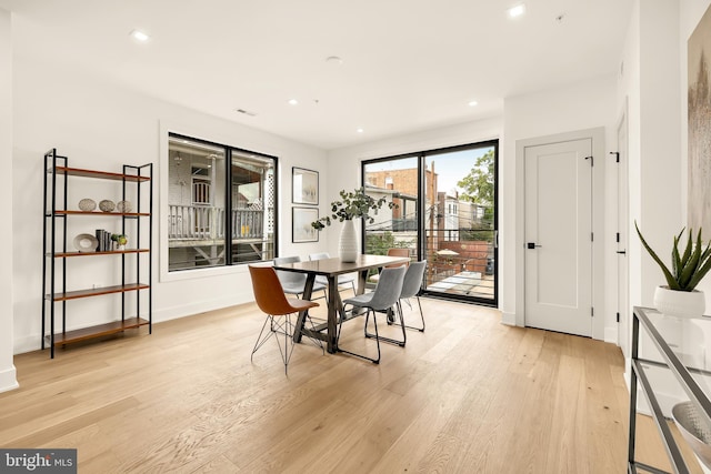 dining room featuring light hardwood / wood-style floors