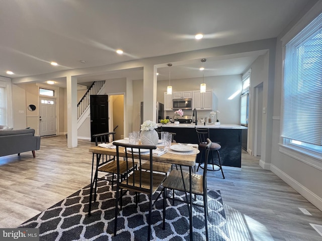 dining area featuring light hardwood / wood-style floors