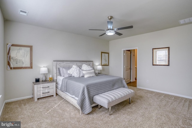 bedroom with light colored carpet and ceiling fan