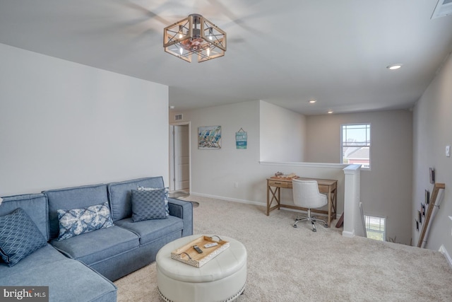 living room featuring light colored carpet