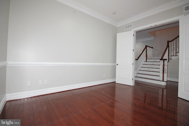 unfurnished room featuring dark hardwood / wood-style flooring and crown molding