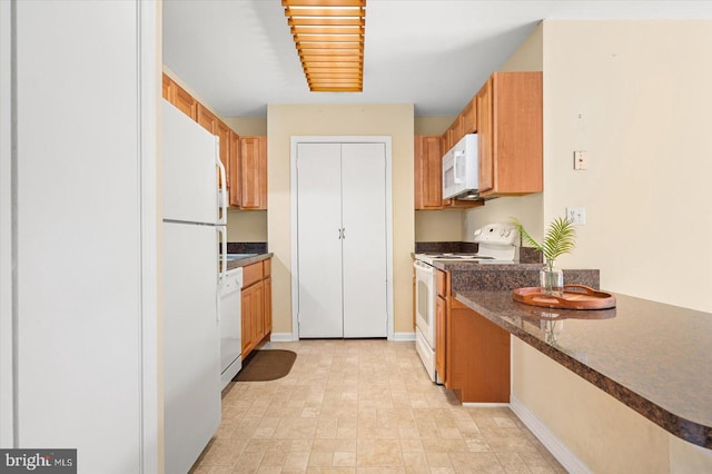 kitchen featuring white appliances