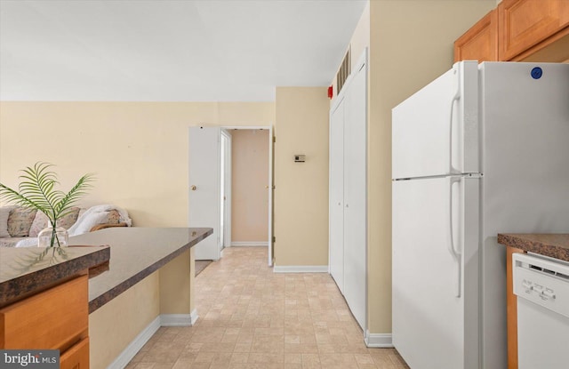 kitchen featuring white appliances