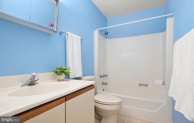 full bathroom with vanity, toilet, tile patterned floors, and shower / washtub combination