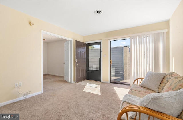 sitting room with light carpet