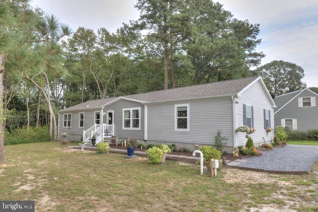 view of front of house with a front lawn