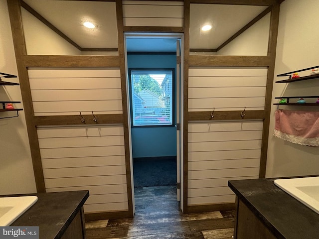 mudroom with crown molding and dark hardwood / wood-style flooring