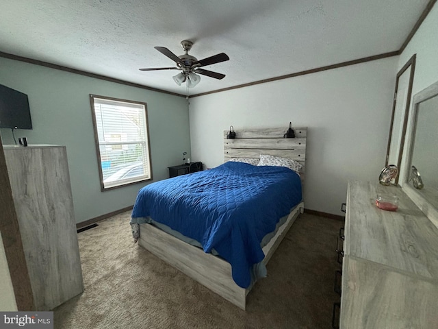 bedroom featuring crown molding, carpet floors, a textured ceiling, and ceiling fan