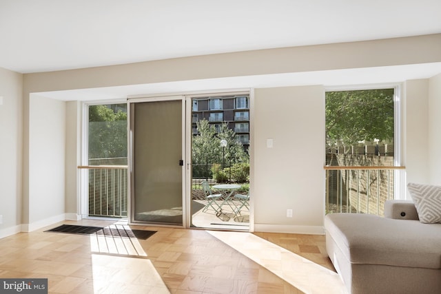 entryway with light parquet floors