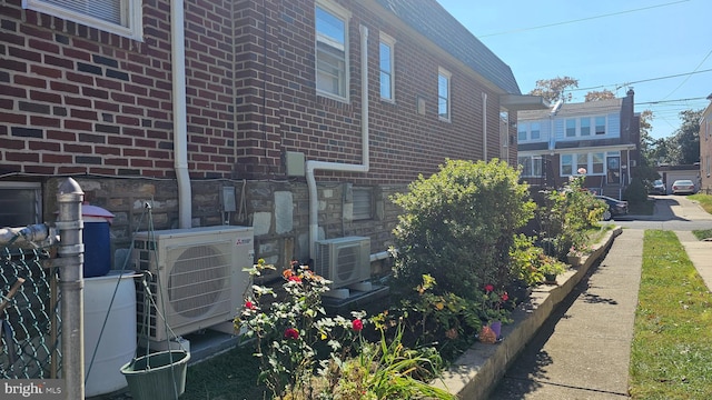 view of property exterior with ac unit