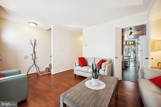 living room featuring dark hardwood / wood-style floors