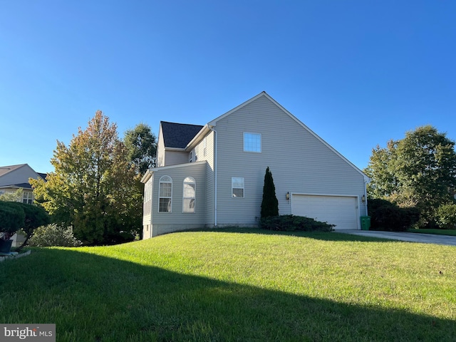 view of side of property with a lawn