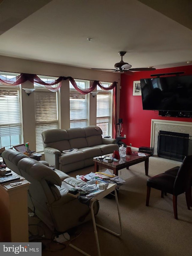 living room with carpet flooring and ceiling fan