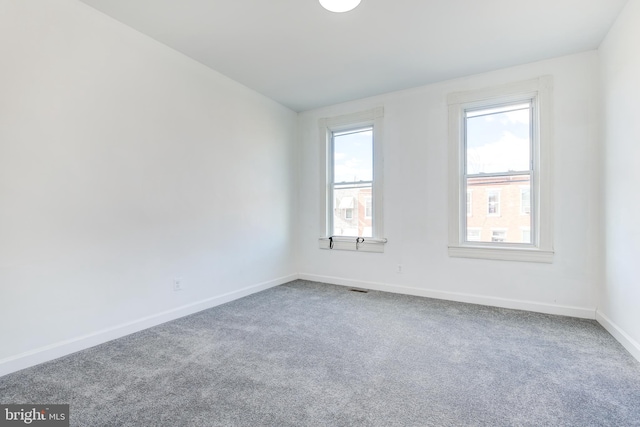 unfurnished room with carpet