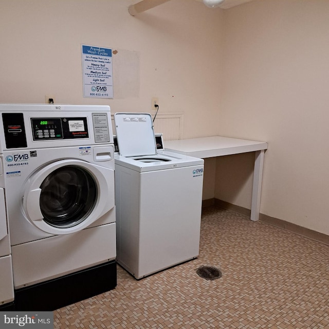 washroom with separate washer and dryer