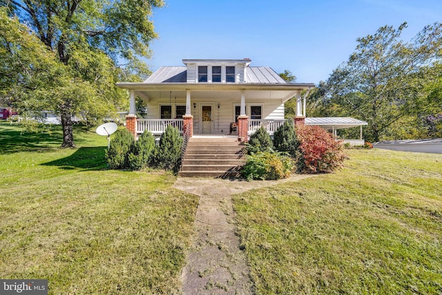 bungalow-style house featuring a porch and a front lawn